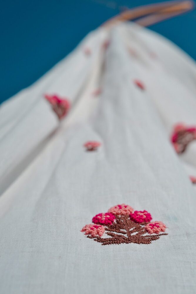 White Khadi With Gulmohar Fabric